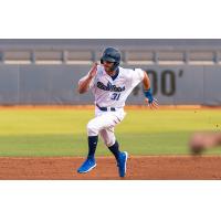 Donovan Casey of the Tulsa Drillers rounds second on his way to third