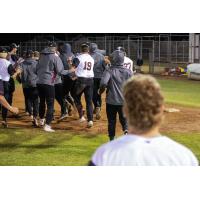 Wisconsin Rapids Rafters mob Levi Jensen after his walk-off hit