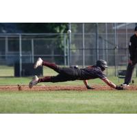 Wisconsin Rapids Rafters dive for the bag