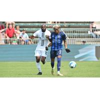 Lexington Sporting Club midfielder Don Smart (left) vs. North Carolina FC