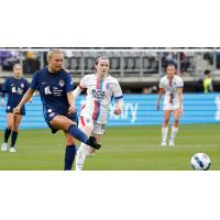 Midfielder Taylor Aylmer (left) with the Washington Spirit