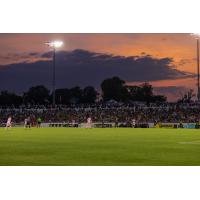 Richmond Kickers and Forward Madison FC on the field