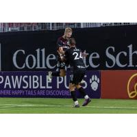 Richmond Kickers' Michael Hornsby and Nathan Aune celebrate win