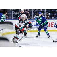 Kelowna Rockets' Marek Rocak and Swift Current Broncos' Zach Turner on game night