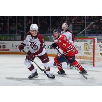 Peterborough Petes' Cam Gauvreau and Liam Sztuska and Oshawa Generals' Dylan Roobroeck on the ice