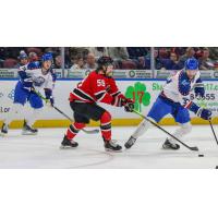 Rapid City  Rush's Rhett Kingston and Wichita Thunder's Jason Pineo in action