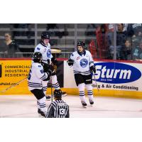 Wenatchee Wild's Kenta Isogai, Conor Geekie, and Matt Savoie on the ice