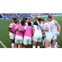 Racing Louisville FC huddle