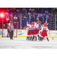 Allen Americans celebrate a comeback win over the Tulsa Oilers