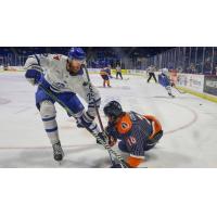 Wichita Thunder forward Michal Stinil (left) vs. the Tulsa Oilers