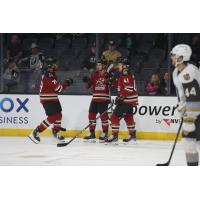 Tucson Roadrunners' Dylan Guenther, Austin Poganski, and Montana Onyebuchi on game night