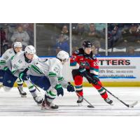 Seattle Thunderbirds' Sam Popowich, Luca Hauf, and Simon Lovsin versus Kelowna Rockets' Gabriel Szturc