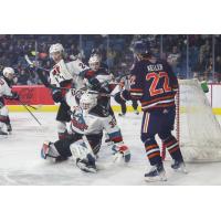 Kelowna Rockets' Nathan Kam and Kamloops Blazers' Jordan Keller on game night