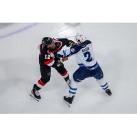 Belleville Senators left wing Bokondji Imama (left) tangles with defenceman Tyrel Bauer