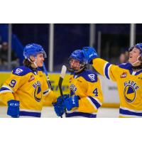 Saskatoon Blades' Rhett Melnyk and Brayden Klimpke on game night