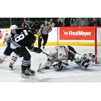 Wenatchee Wild's Hayden Moore battles Kamloops Blazers' Dylan Ernst