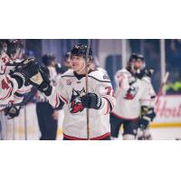 Adirondack Thunder defenseman Tristan Thompson receives a fist bump