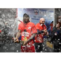 Atlético Ottawa forward Ballou Tabla (left) and Head Coach Carlos González celebrating 2022 CPL Regular Season title