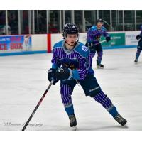 Madison Capitols forward Quinn Finley wears a Madison Monsters jersey