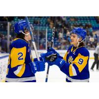 Saskatoon Blades' Ben Saunderson and Rhett Melnyk on game night