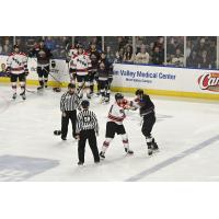 Rapid City Rush's Jarrod Gourley and Utah Grizzlies' Josh Wesley drop gloves