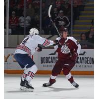 Oshawa Generals' Connor Punnett versus Peterborough Petes' Nico Addy