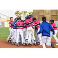 Pensacola Blue Wahoos mob J.D. Osborne after a walk-off win