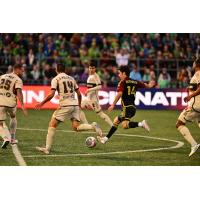 Los Angeles FC's Maxime Chanot and Sergi Palencia and Seattle Sounders FC's Paul Rothrock in action