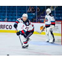 Kelowna Rockets' Ethan Mittelsteadt and Nathan Kam on the ice