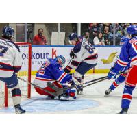 Kitchener Rangers' Jackson Parsons battles Saginaw Spirit's Kristian Epperson