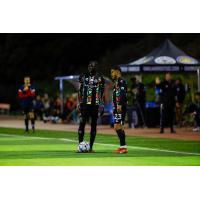 Oakland Roots' Baboucarr Njie and Memo Diaz