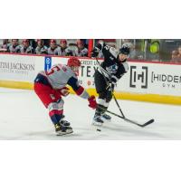 Wichita Thunder forward Michal Stinil (right) vs. the Allen Americans