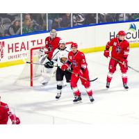 Allen Americans defenseman Hudson Wilson (center)