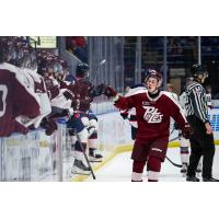 Francis Parish receives congratulations from Peterborough Petes bench