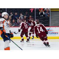 Peterborough Petes react after Gavin Bryant's goal