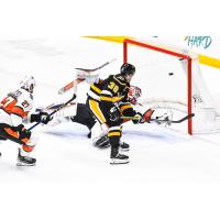 Kansas City Mavericks' Jake McLaughlin and Wheeling Nailers' Matt Koopman in action