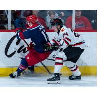 Rapid City Rush center Chaz Smedsrud (right) vs. the Allen Americans