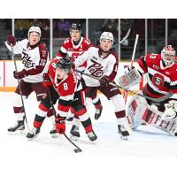 Peterborough Petes right wing Brady Stonehouse (far left) and centre Brody  Partridge vs. the Ottawa 67's