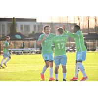 Sounders FC reacts after a goal against Louisville City FC