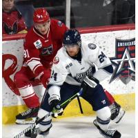 Allen Americans right wing Brian Chambers (left) battles against the Worcester Railers