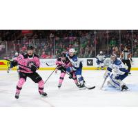 Texas Stars' Jack Becker and Mathias Emilio Pettersen battle Colorado Eagles' Jack Ahcan and Trent Miner