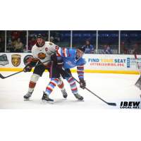 Indy Fuel defenseman Christopher Cameron (left) vs. the Bloomington Bison