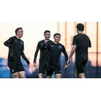 Louisville City FC react after a goal