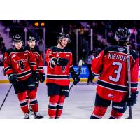 Red Deer Rebels exchange fist bumps