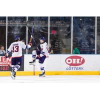 Youngstown Phantoms defenseman Luke Osburn (left) rushes to congratulate Jack Willson