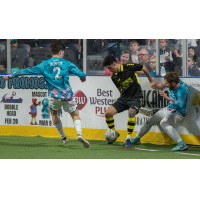 St. Louis Ambush forward Triston Austin (left) and defender Dylan Hundelt battle the Milwaukee Wave