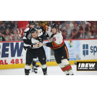 Indy Fuel Sell defenseman Christopher Cameron (right) takes out his frustrations on the Wichita Thunder