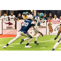 Massachusetts Pirates receiver Isaac Zico (right) vs. the Jacksonville Sharks