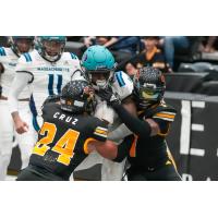 Massachusetts Pirates battle for yardage against the Tucson Sugar Skulls