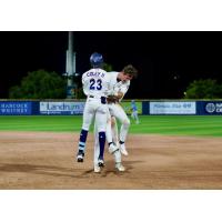 Pensacola Blue Wahoos celebrate Johnny Olmstead's game-winning single